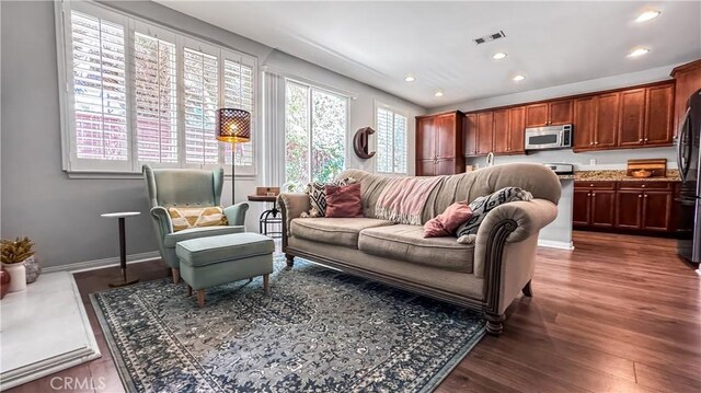 24939 Coral Canyon Rd, Corona, CA 92883 - living room featuring dark wood-style floors, recessed lighting, and baseboards