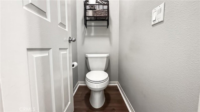 24939 Coral Canyon Rd, Corona, CA 92883 - bathroom with toilet, baseboards, and wood finished floors