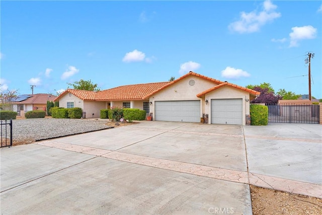 19804 Haida Rd, Apple Valley, CA 92307 - view of front of house featuring stucco siding, an attached garage, and a tiled roof