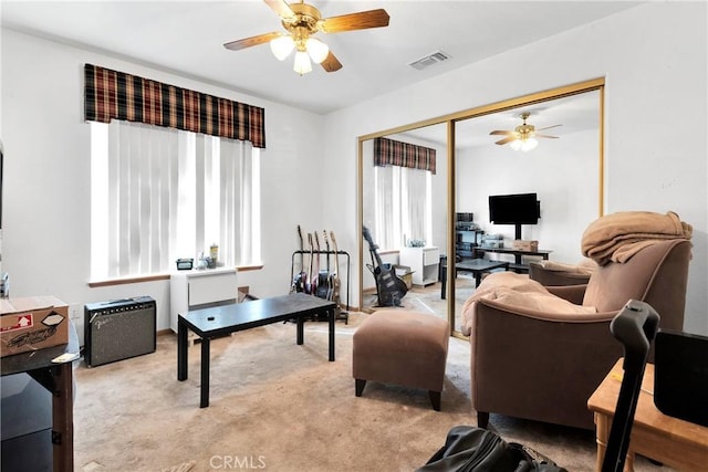 19804 Haida Rd, Apple Valley, CA 92307 - living area with ceiling fan, light colored carpet, and visible vents