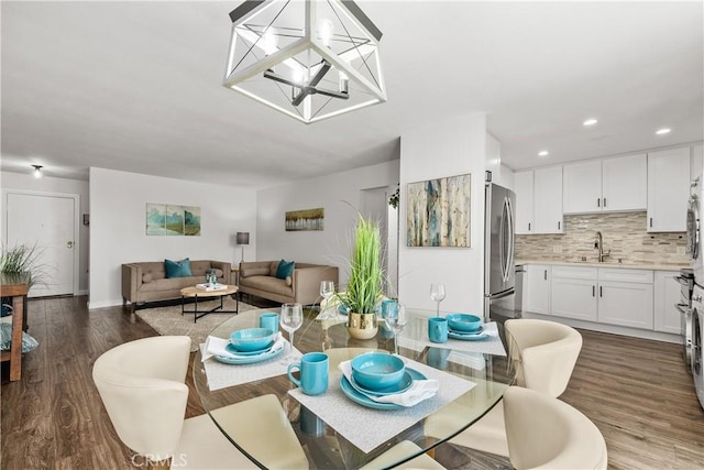 545 Chestnut Ave Unit 202, Long Beach, CA 90802 - dining space featuring recessed lighting, baseboards, and dark wood-type flooring