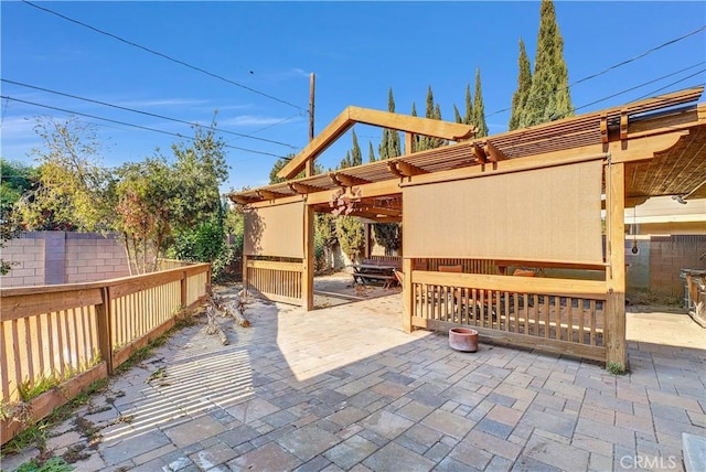 view of patio with fence
