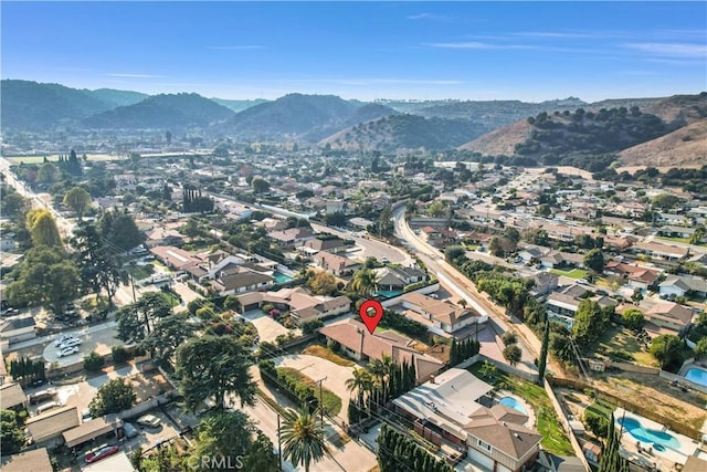 aerial view with a residential view and a mountain view
