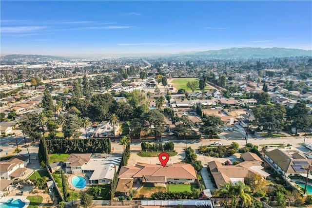 birds eye view of property with a residential view