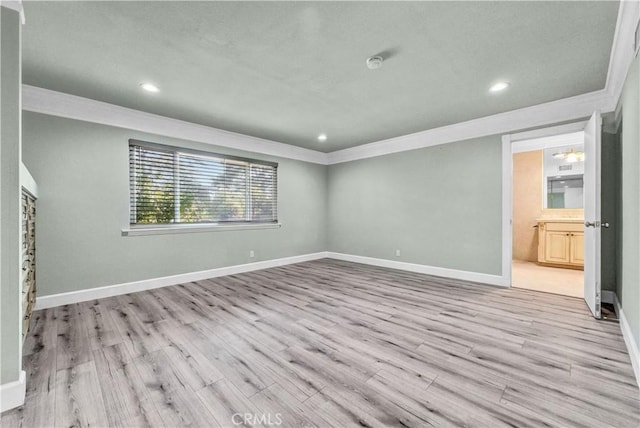 unfurnished bedroom featuring recessed lighting, baseboards, ornamental molding, and wood finished floors