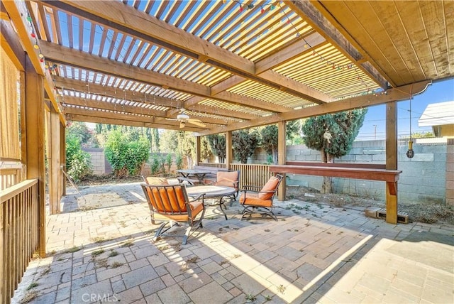 view of patio / terrace featuring a fenced backyard, outdoor dining space, and a pergola
