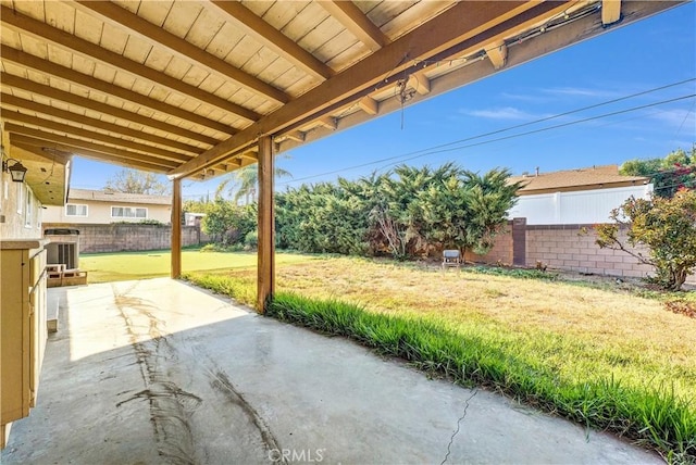 view of patio / terrace with a fenced backyard and central air condition unit