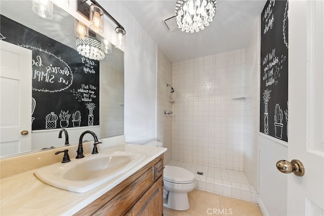 845 N Glendora Ave, Glendora, CA 91741 - bathroom featuring toilet, a tile shower, tile patterned floors, and vanity