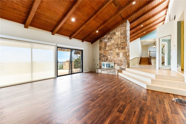 845 N Glendora Ave, Glendora, CA 91741 - unfurnished living room featuring high vaulted ceiling, a stone fireplace, wooden ceiling, wood finished floors, and beamed ceiling