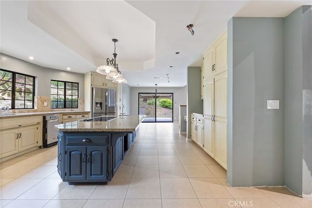 845 N Glendora Ave, Glendora, CA 91741 - kitchen with a healthy amount of sunlight, cream cabinets, stainless steel appliances, and light tile patterned flooring
