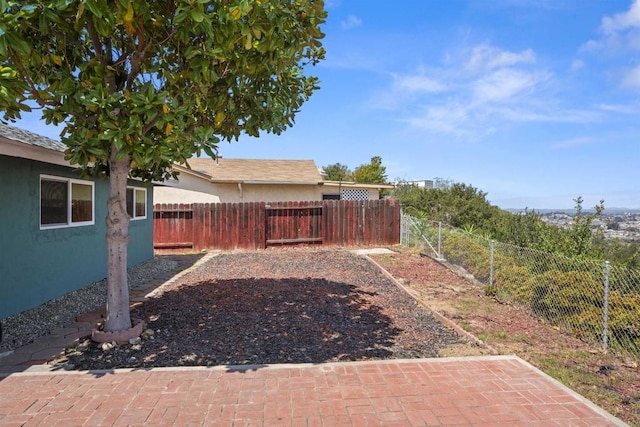 view of yard featuring a fenced backyard and a patio area