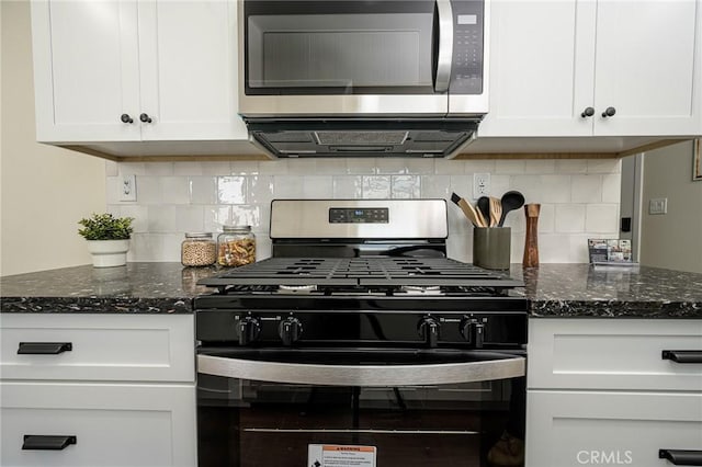 4548 Jade St, Los Angeles, CA 90032 - kitchen featuring backsplash, stainless steel appliances, and white cabinetry