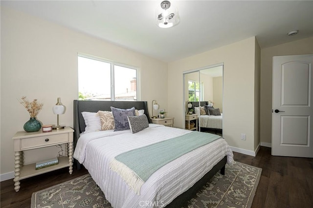 4548 Jade St, Los Angeles, CA 90032 - bedroom featuring baseboards, wood finished floors, and a closet