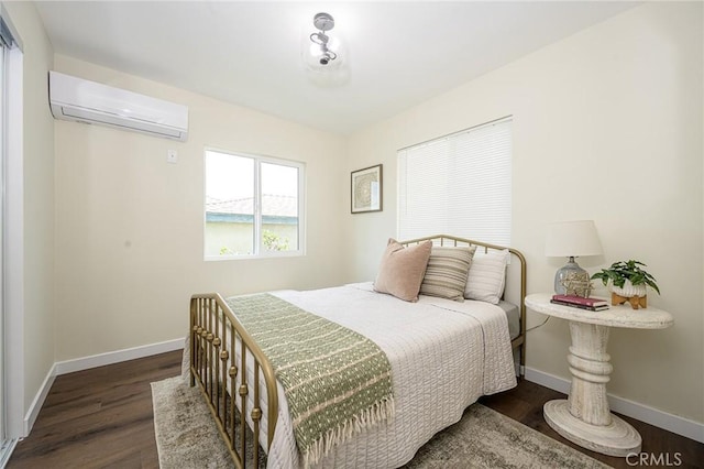 4548 Jade St, Los Angeles, CA 90032 - bedroom featuring baseboards, a wall mounted AC, and wood finished floors