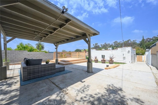 4548 Jade St, Los Angeles, CA 90032 - view of patio featuring a fenced backyard and a deck