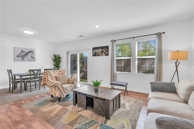7353 W Ellena W Unit 83, Rancho Cucamonga, CA 91730 - living room with light wood finished floors, baseboards, and recessed lighting