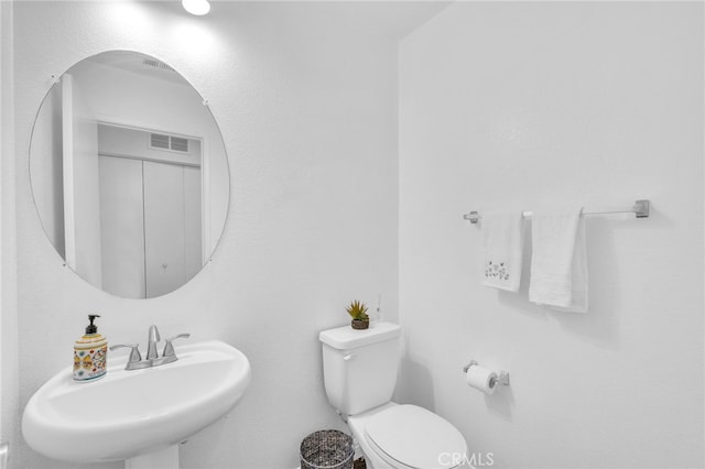 7353 W Ellena W Unit 83, Rancho Cucamonga, CA 91730 - half bathroom featuring a sink and toilet