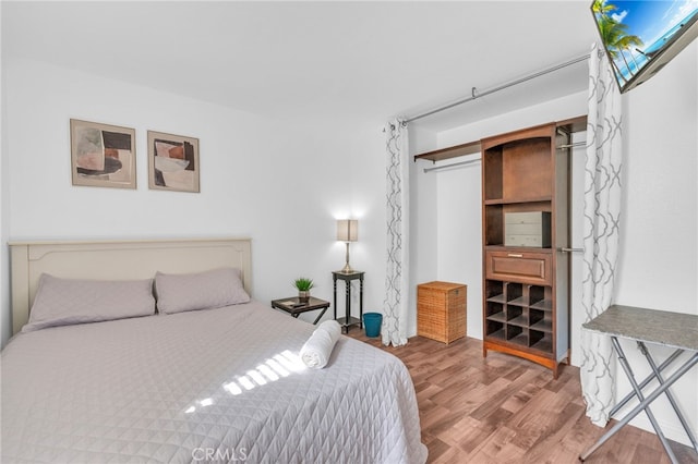 7353 W Ellena W Unit 83, Rancho Cucamonga, CA 91730 - bedroom featuring wood finished floors