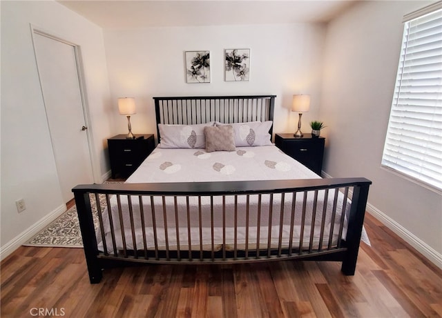 7353 W Ellena W Unit 83, Rancho Cucamonga, CA 91730 - bedroom featuring wood finished floors and baseboards