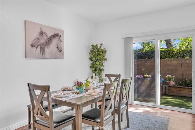 7353 W Ellena W Unit 83, Rancho Cucamonga, CA 91730 - dining room featuring wood finished floors
