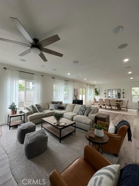 27041 S Ridge Dr, Mission Viejo, CA 92692 - living area featuring wood finished floors, a ceiling fan, and recessed lighting
