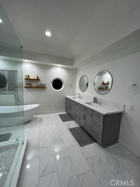 27041 S Ridge Dr, Mission Viejo, CA 92692 - full bathroom with double vanity, a freestanding tub, marble finish floors, recessed lighting, and a shower