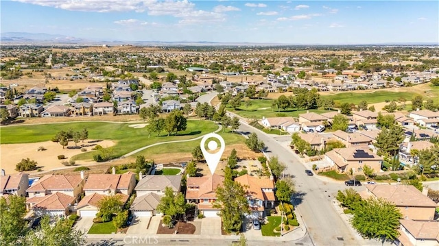 aerial view with a residential view and golf course view