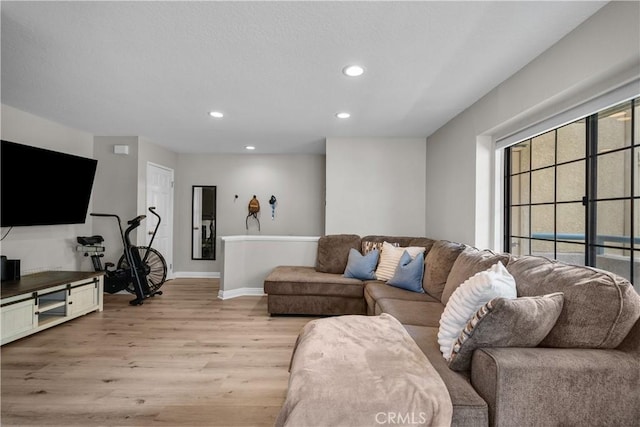 18114 Erik Ct Unit 5131, Canyon Country, CA 91387 - living area featuring light wood-style floors, baseboards, and recessed lighting