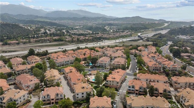 18114 Erik Ct Unit 5131, Canyon Country, CA 91387 - aerial overview of property's location with a mountainous background and nearby suburban area