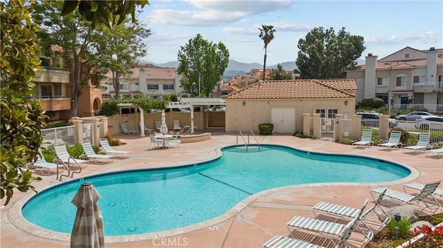 18114 Erik Ct Unit 5131, Canyon Country, CA 91387 - community pool featuring fence, a patio area, a pergola, and a mountain view