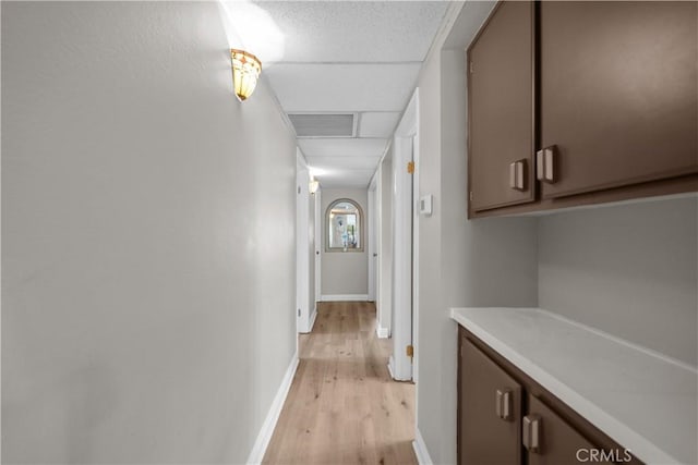 18114 Erik Ct Unit 5131, Canyon Country, CA 91387 - corridor featuring light wood-style flooring and baseboards