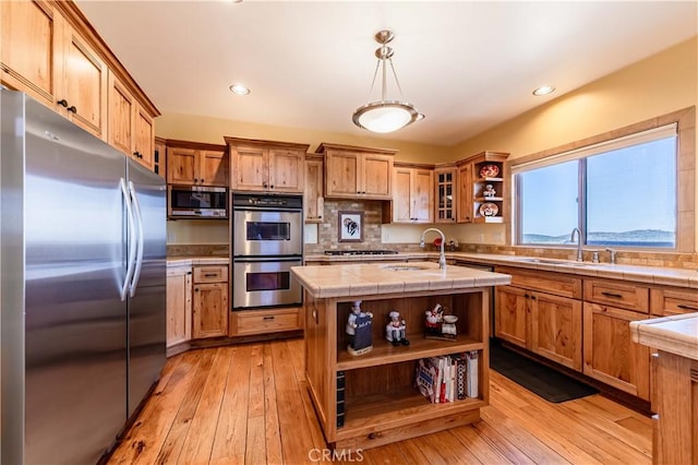 35155 Sawh Ct, Sage, CA 92544 - kitchen with stainless steel appliances, open shelves, a sink, light wood-style flooring, and recessed lighting