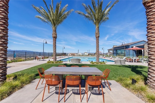 18147 Jupiter Ln, Saugus, CA 91350 - community pool with a patio and outdoor dining area