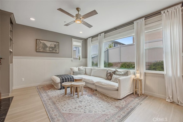 18147 Jupiter Ln, Saugus, CA 91350 - living area featuring light wood-type flooring, a ceiling fan, wainscoting, baseboards, and recessed lighting