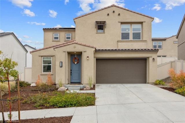 18147 Jupiter Ln, Saugus, CA 91350 - mediterranean / spanish home with a tile roof, stucco siding, a garage, and driveway
