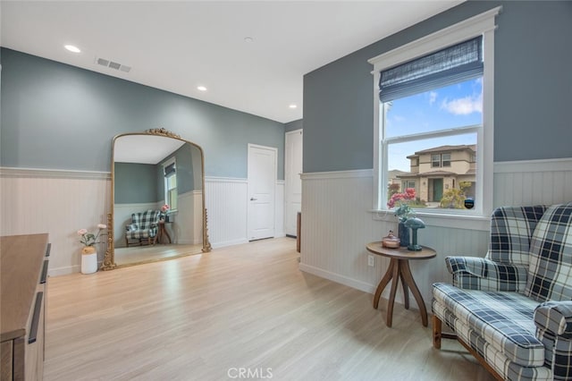 18147 Jupiter Ln, Saugus, CA 91350 - living area with wainscoting, wood finished floors, and recessed lighting