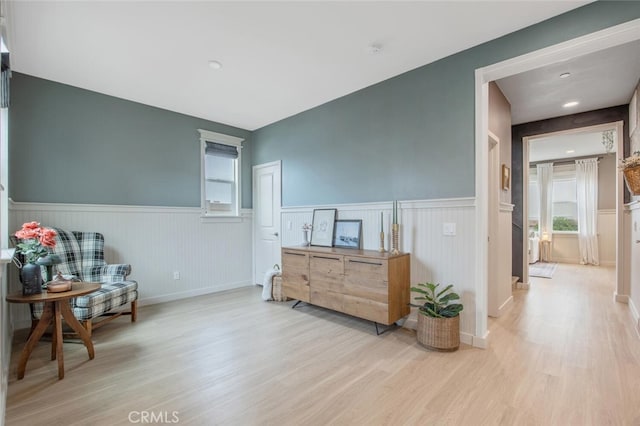 18147 Jupiter Ln, Saugus, CA 91350 - sitting room featuring a wainscoted wall and wood finished floors
