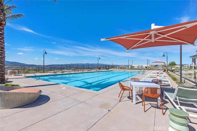 18147 Jupiter Ln, Saugus, CA 91350 - community pool featuring a patio area