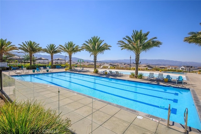 18147 Jupiter Ln, Saugus, CA 91350 - community pool with a mountain view and a patio