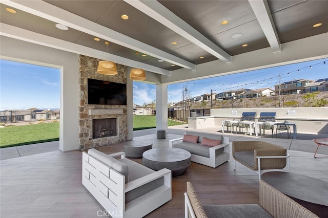 18147 Jupiter Ln, Saugus, CA 91350 - view of patio featuring an outdoor living space with a fireplace and a residential view