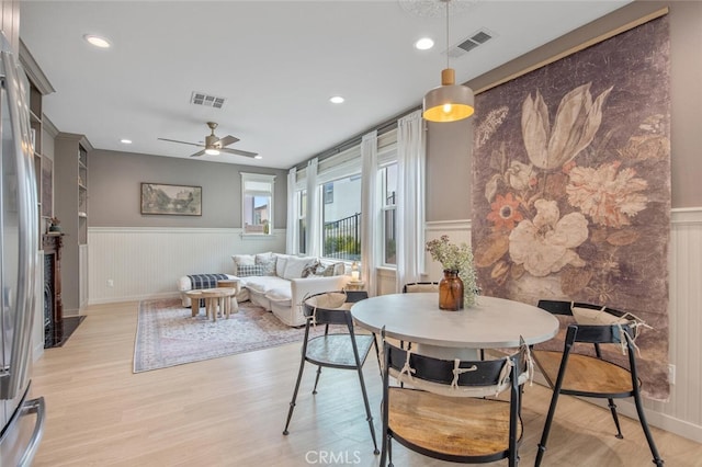 18147 Jupiter Ln, Saugus, CA 91350 - dining space featuring a ceiling fan, wainscoting, light wood-style floors, and recessed lighting