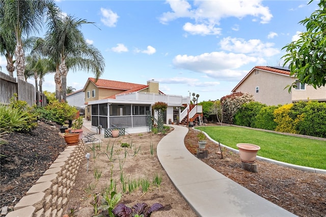 45628 Gleneagles Ct, Temecula, CA 92592 - mediterranean / spanish-style home featuring stairs, a sunroom, and a front lawn