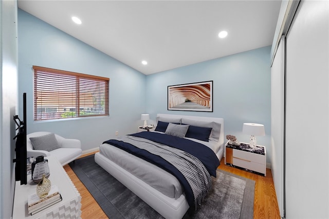 45628 Gleneagles Ct, Temecula, CA 92592 - bedroom with recessed lighting, baseboards, vaulted ceiling, and wood finished floors