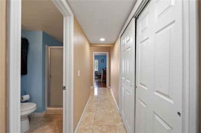 45628 Gleneagles Ct, Temecula, CA 92592 - hallway with light tile patterned floors and baseboards
