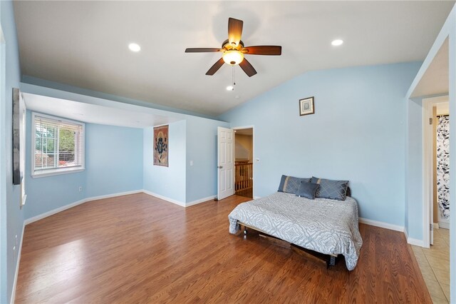 45628 Gleneagles Ct, Temecula, CA 92592 - bedroom with ceiling fan, vaulted ceiling, baseboards, light wood finished floors, and recessed lighting