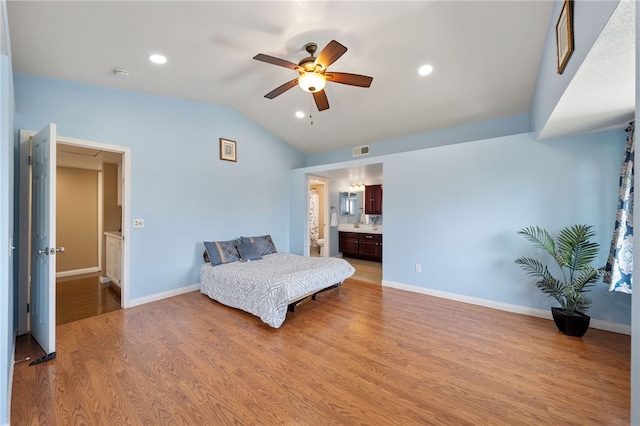 45628 Gleneagles Ct, Temecula, CA 92592 - bedroom featuring visible vents, baseboards, vaulted ceiling, and light wood-type flooring