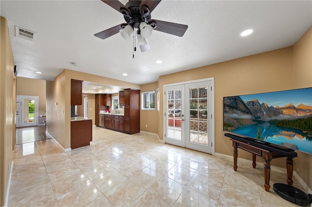 45628 Gleneagles Ct, Temecula, CA 92592 - interior space with a ceiling fan, french doors, visible vents, light countertops, and baseboards
