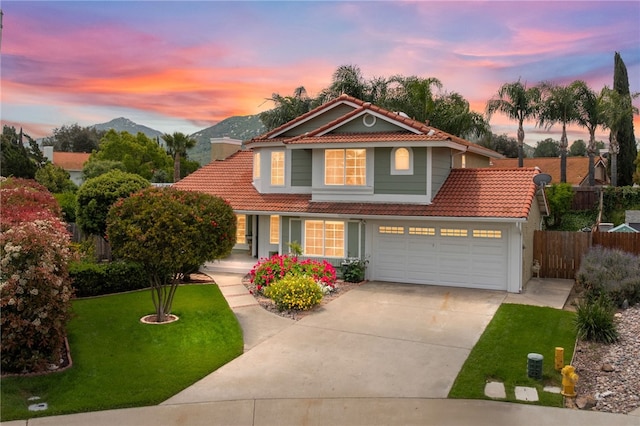 45628 Gleneagles Ct, Temecula, CA 92592 - traditional home featuring fence, a front lawn, a tile roof, a garage, and driveway