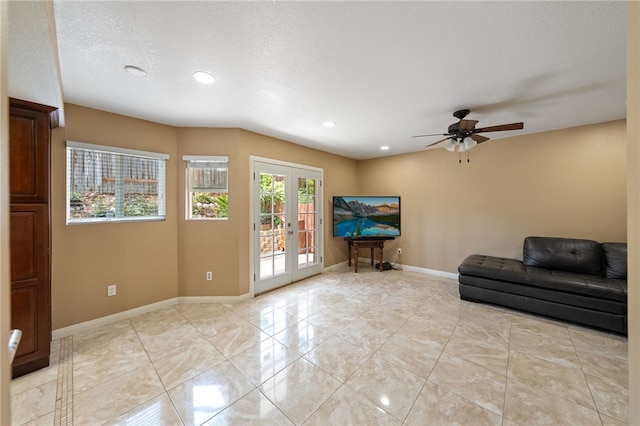 45628 Gleneagles Ct, Temecula, CA 92592 - living area with french doors, recessed lighting, baseboards, and ceiling fan