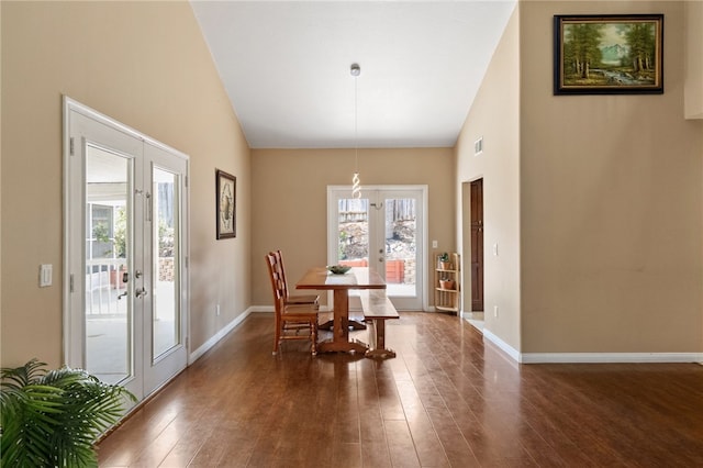 45628 Gleneagles Ct, Temecula, CA 92592 - dining space with french doors, visible vents, high vaulted ceiling, baseboards, and dark wood-style floors